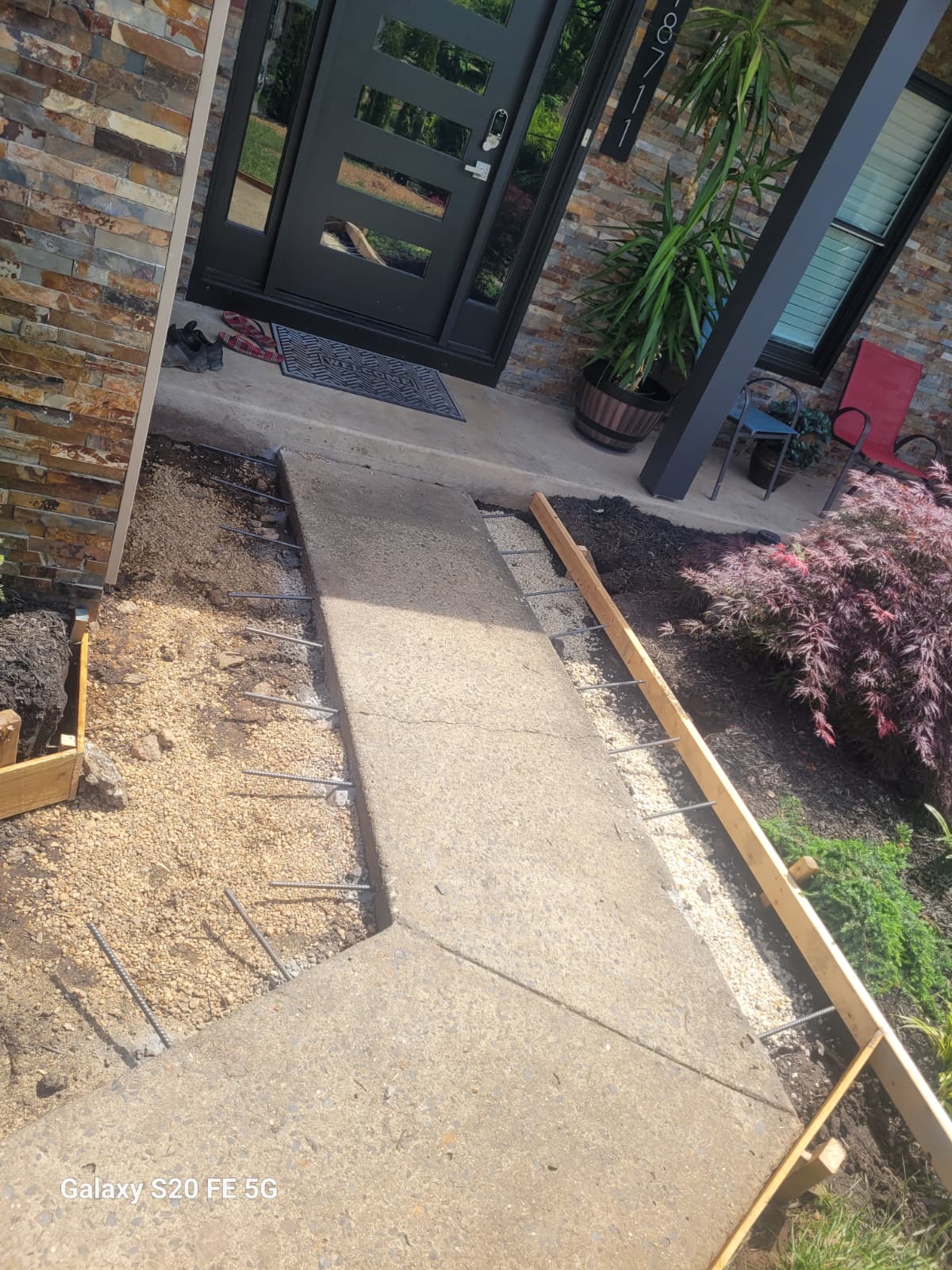 Gallery Concrete walkway and porch restoration project by Perfectum Construction & Plumbing in Gaithersburg, MD.