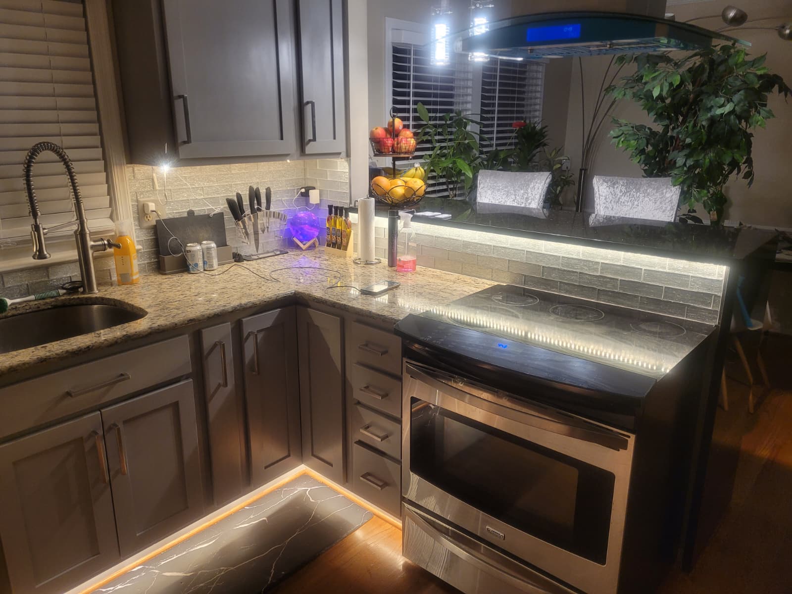 Gallery Completed kitchen remodeling project with modern appliances and updated cabinetry by Perfectum Construction & Plumbing.