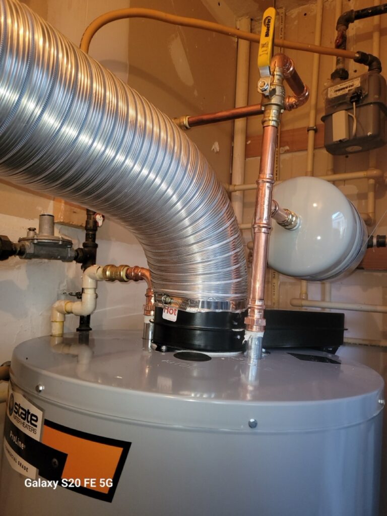 Home State ProLine water heater with durable venting and copper plumbing connections by Perfectum in Gaithersburg, MD.