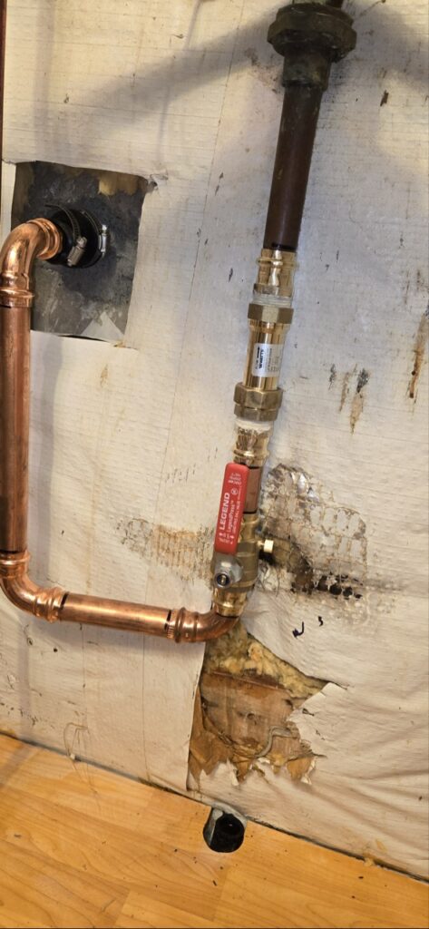 Gallery Copper plumbing pipes and valves installed during Perfectum Plumbing remodeling project in Gaithersburg, MD.