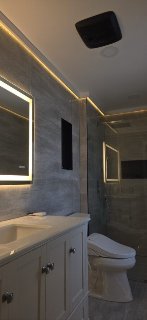Gallery Newly remodeled bathroom showcasing Perfectum Construction & Plumbing's kitchen and bathroom upgrades.