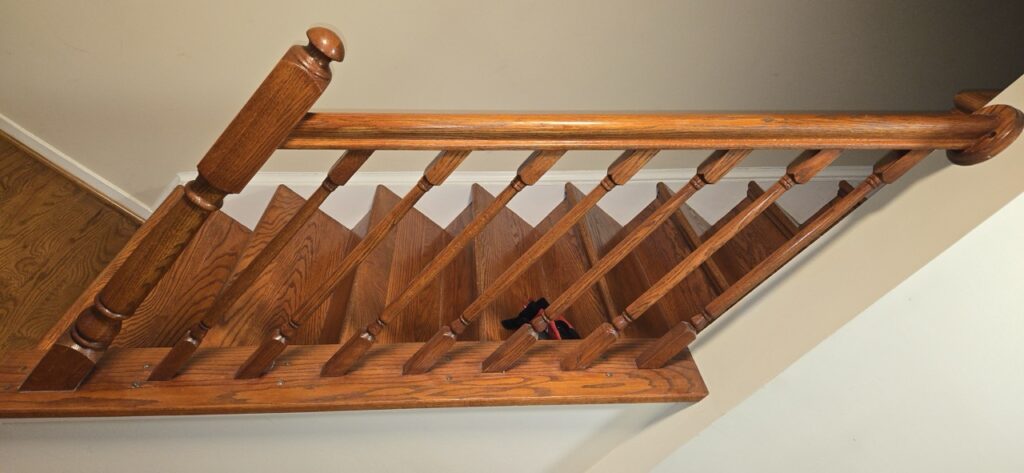 Gallery Wooden staircase restoration and remodeling project by Perfectum Construction & Plumbing.
