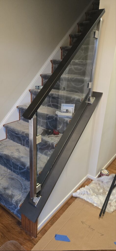 Gallery Modern glass and metal railing installation in Gaithersburg, MD home remodel.