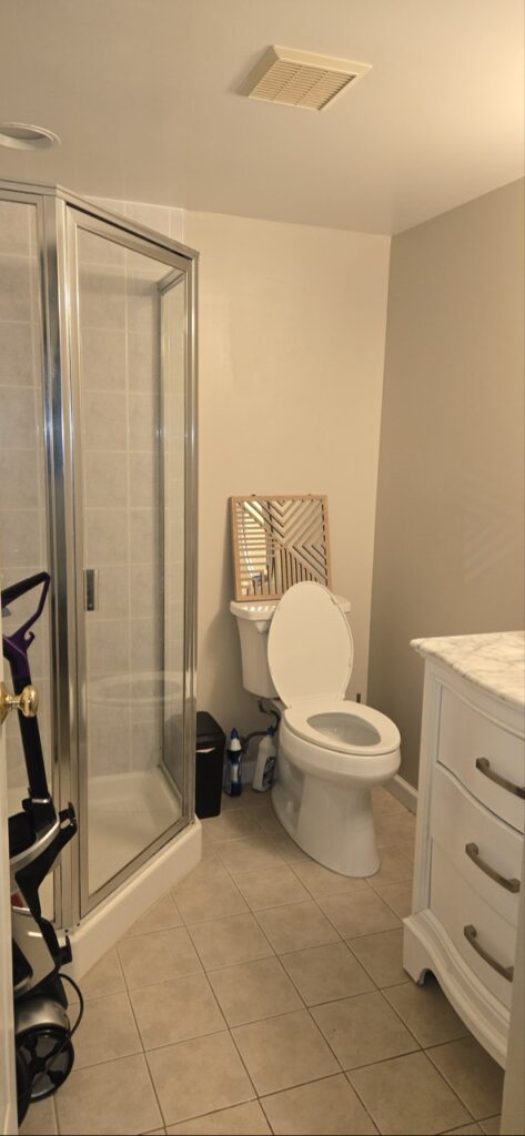 Gallery Bathroom remodeling project by Perfectum Construction & Plumbing in Gaithersburg, MD, featuring a new shower enclosure and toilet.