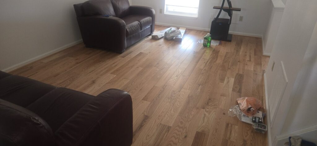 Gallery Perfectum Construction & Plumbing: Completed house remodeling and restoration project in Gaithersburg, MD featuring new hardwood floors.