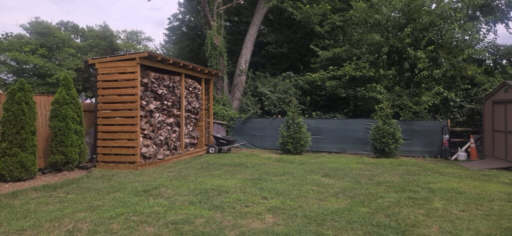 Gallery Wood storage shed and landscaping in Gaithersburg, MD home remodeling project.