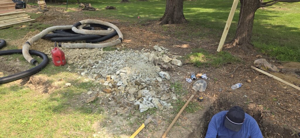 Gallery Plumbing installation and repairs project in Gaithersburg, MD, showing excavation and pipework.