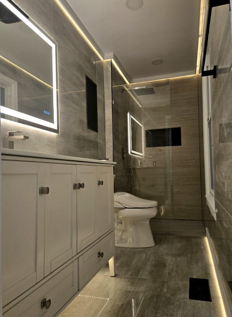 Gallery Modern bathroom remodel with tile shower and vanity by Perfectum Construction & Plumbing.